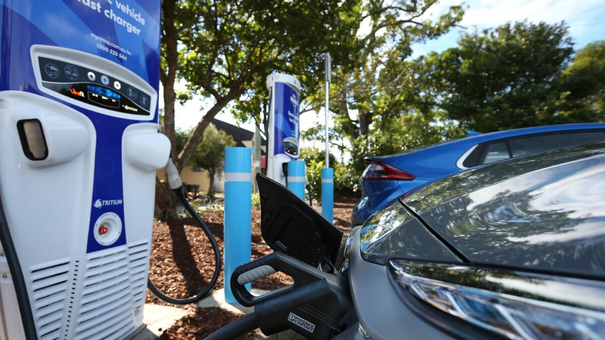 An electric vehicle fast charger in Newcastle, NSW. Picture by Simone De Peak.
