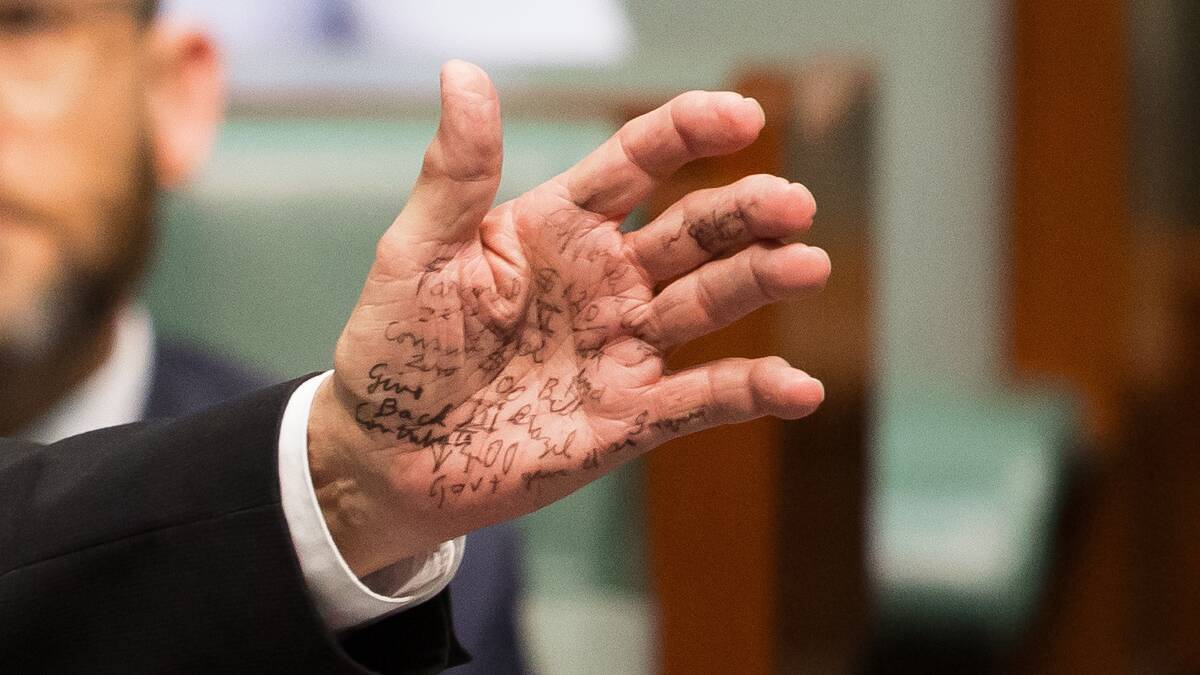 Queensland MP Bob Katter's hand during Question Time. Picture by Sitthixay Ditthavong.