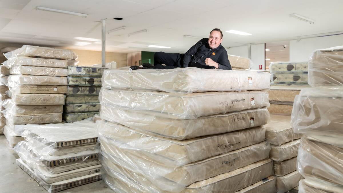 Main Mattresses consultant Michael King with the many mattresses on display. Picture by Karleen Minney