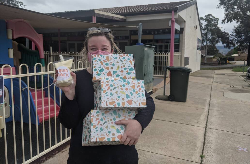 Freya Kristiansen, of Kingston, was lucky enough to bag three pies - and some "liquid crack". Picture: Megan Doherty