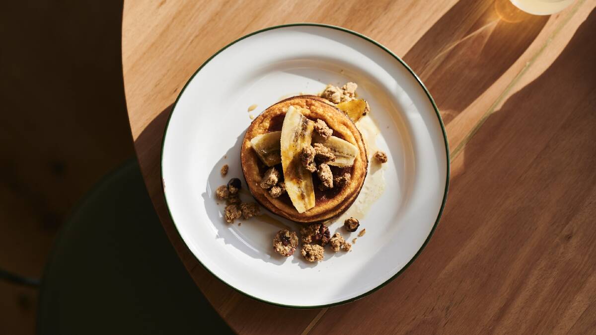 A bridge-to-bridge brunch: Ricotta hot cakes, caramelised Manuka honey and pecan crumble at the Walter Cafe. Picture: Ash St George