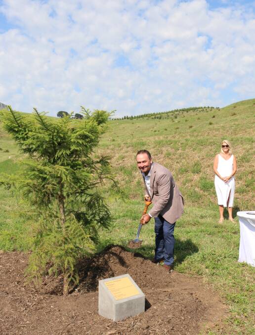 Ricky Stuart puts the finishing touch on the planting at the arboretum on Thursday. Picture: Supplied