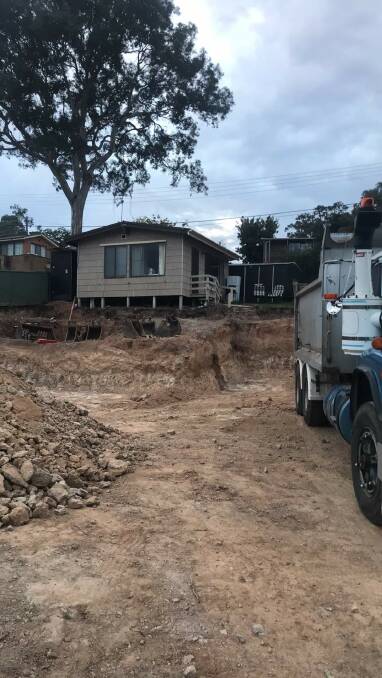 Matt lived in an existing cabin on site while the house was being built on a former Mr Fluffy block in Weston. Picture: Supplied 