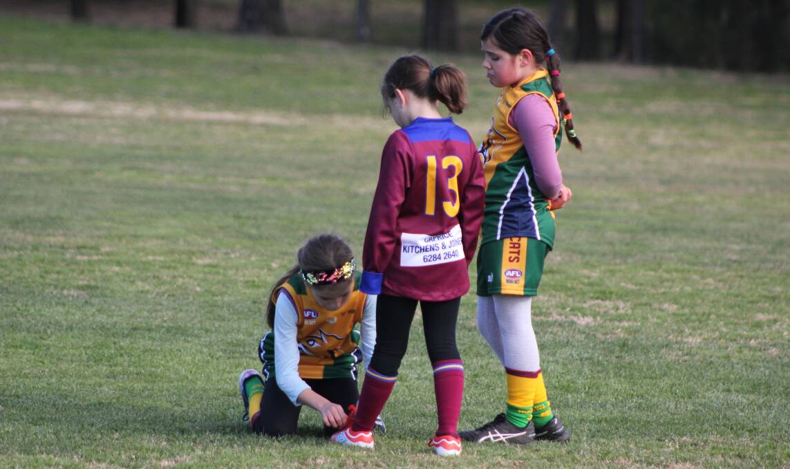 Luke Hickey also caught this beautiful image of sportsmanship - or sportsgirlship - back in 2019. Picture: Luke Hickey