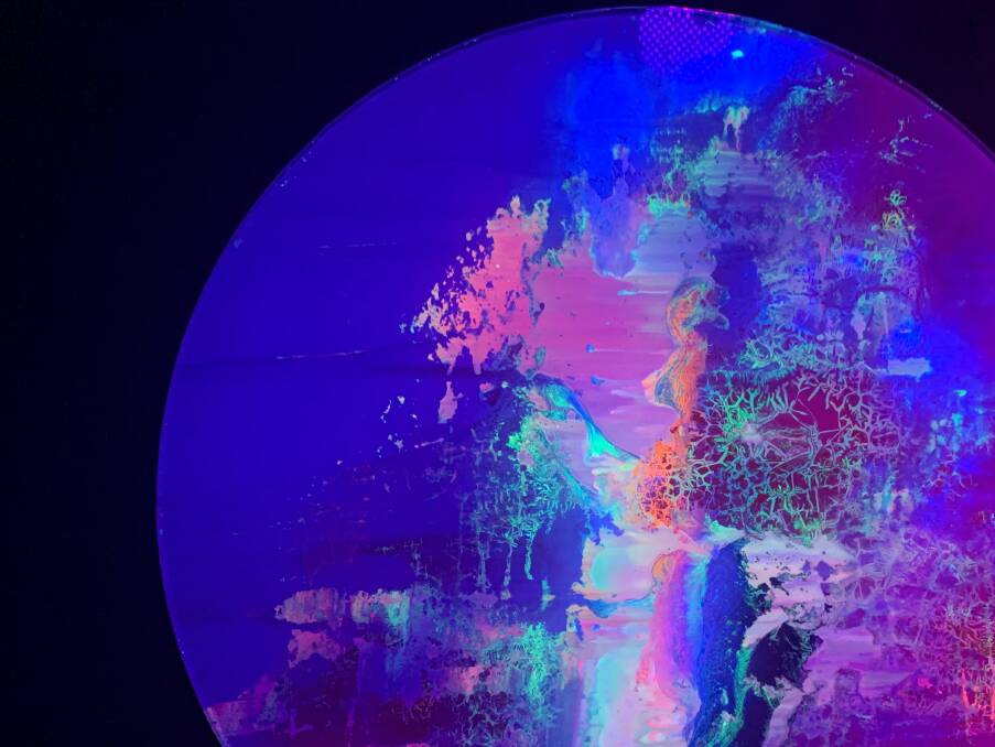 Tommy Balogh paints with light-reactive media so the works change and move with the light.