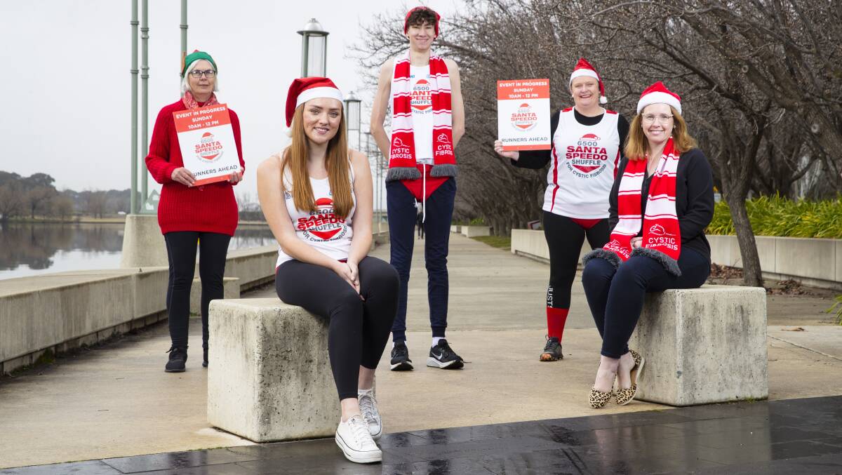 June Gunning, Kate Daly, Hamish Hughes, Heidi Prowse and Sally-Anne Clarke gear up for the next - and final - Santa Speedo Shuffle to support local families with cystic fibrosis. Picture: Keegan Carroll