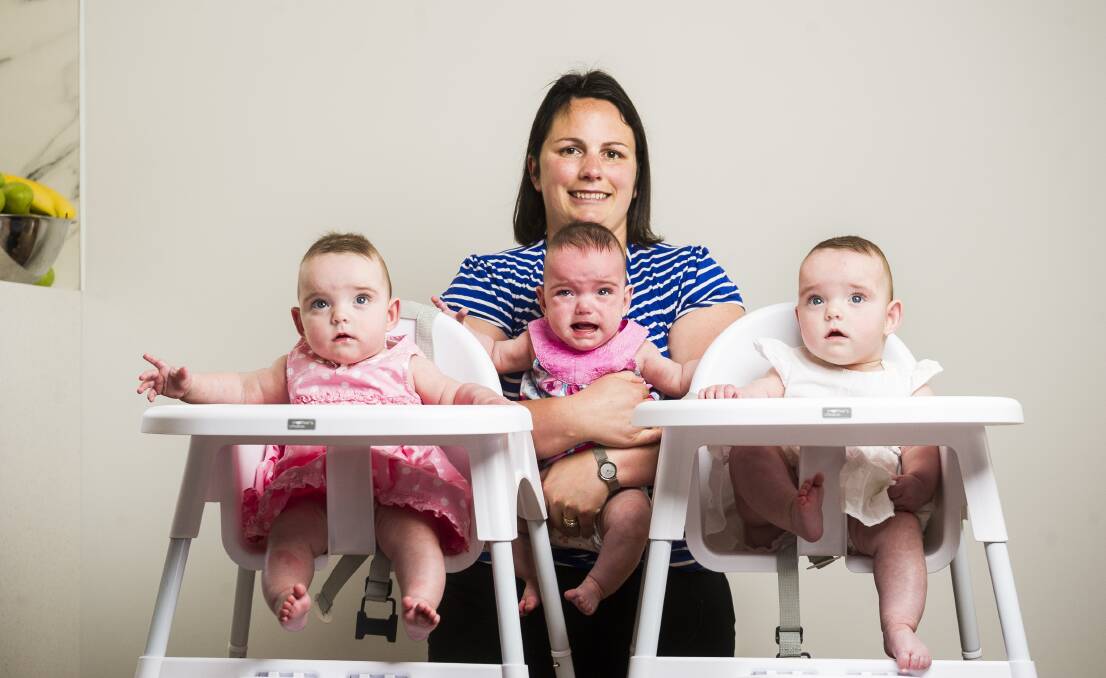 Emma with the triplets when they were seven months old - (l-r) Aleisha, Maddilyn and Eloise. Photo: Dion Georgopoulos