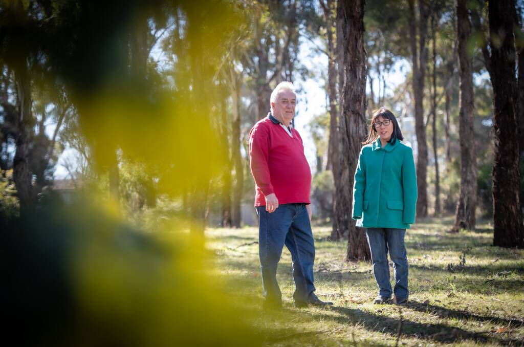Hughes Residents Association co-convenor John Griffin and long-time Garran resident Mari Kondo say the urban open space off Kitchen Street on the border of Hughes and Garran is precious to the local community. Picture: Karleen Minney