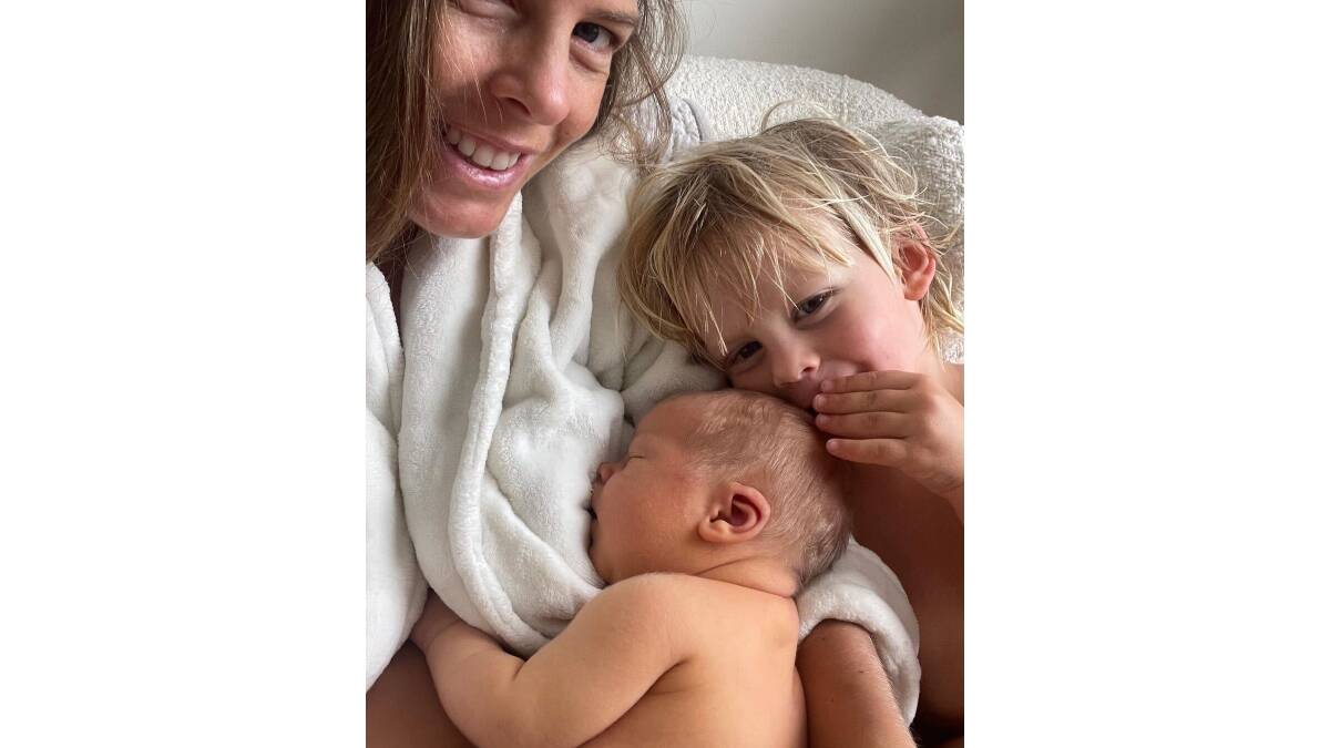 A "blissed-out" Torah Bright with her boys. Picture Instagram
