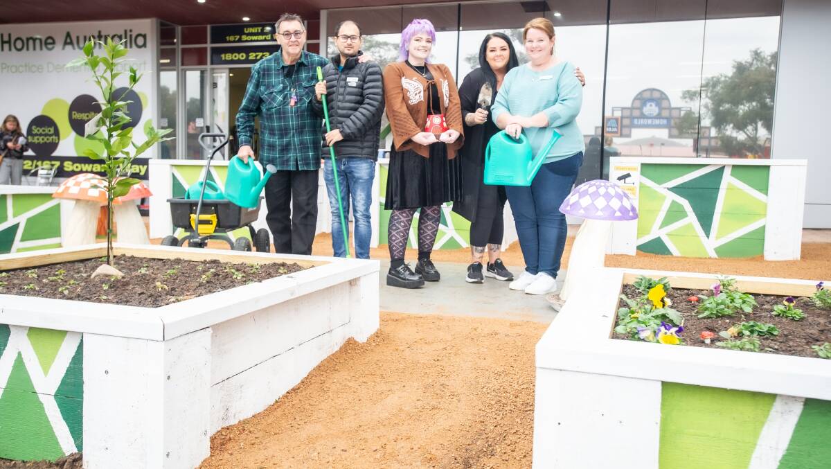 Club Kalina member Jim Olson, corporate services manager Sagar Pokharel, grants and event coordinator Rhiannon Toohey, education coordinator Ashley Carrington quality and programs coordinator Mel Judd enjoying the garden. Picture by Karleen Minney