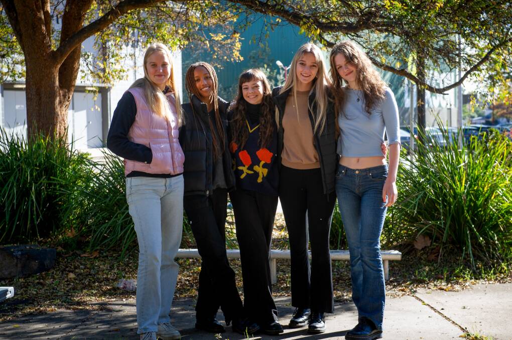 Year 12 student Xanthe Campbell (centre) at Dickson College with her friends Georgie Barnes, Akidi Pickette, Lara Schouten and Vida Rosauer. Picture: Elesa Kurtz