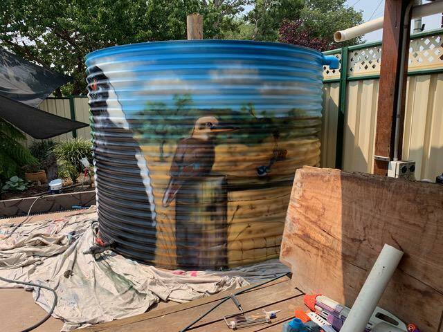 Geoff Filmer has even painted a mural on a home water tank. Picture: Supplied