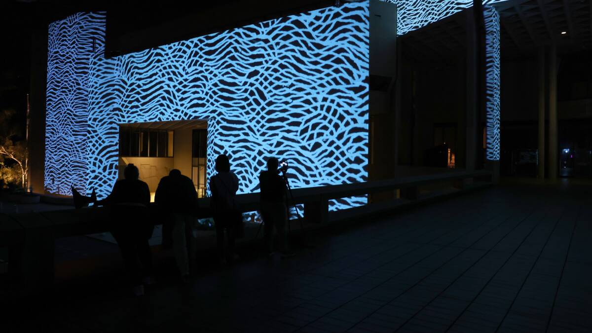 The National Gallery of Australia lit up this week in a sneak peek of this year's Enlighten. Picture by James Croucher