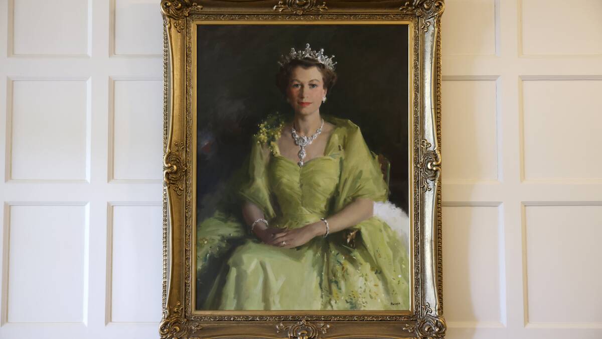 The wattle painting of the newly crowned Queen Elizabeth II was completed by Australian artist Sir William Dargie in 1954. It was on display in the foyer of Government House on Friday. Picture by James Croucher
