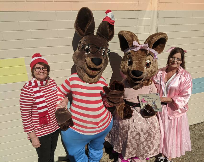 Wanniassa Hills Primary deputy principal Kerry Millington (left) and business manager Nardia Ruhan (right) with Wally and Angelina Ballerina. Picture: Megan Doherty