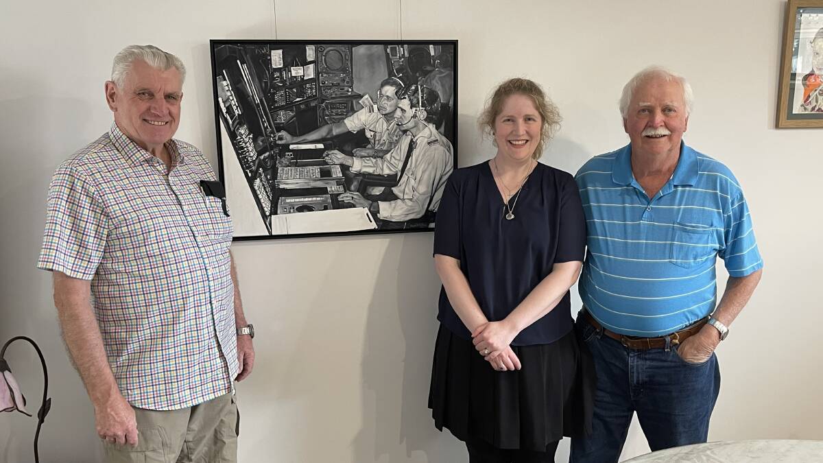 Claire Cusack with her father Roger Wimhurst, right, and Tony O'Neill with her painting of them. Picture supplied