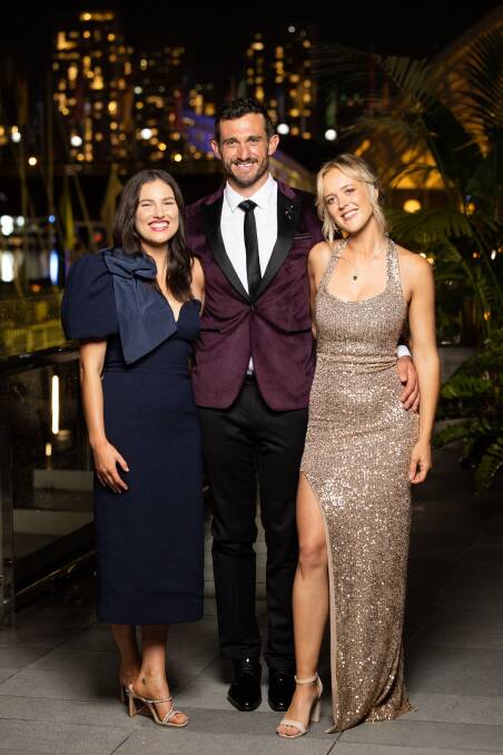 Farmer Joe all spruced up with Keely and Sarah. Picture supplied 