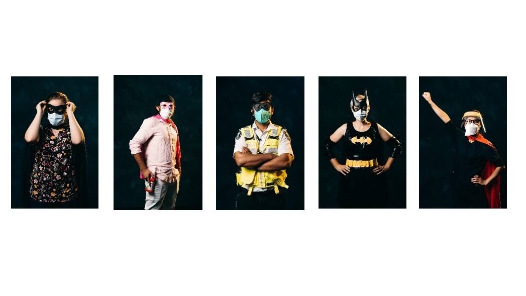 Dion Georgopoulos's Hidden Heroes 1-5 202, digital photographs of frontline workers as super heroes in the Stronger Together exhibition