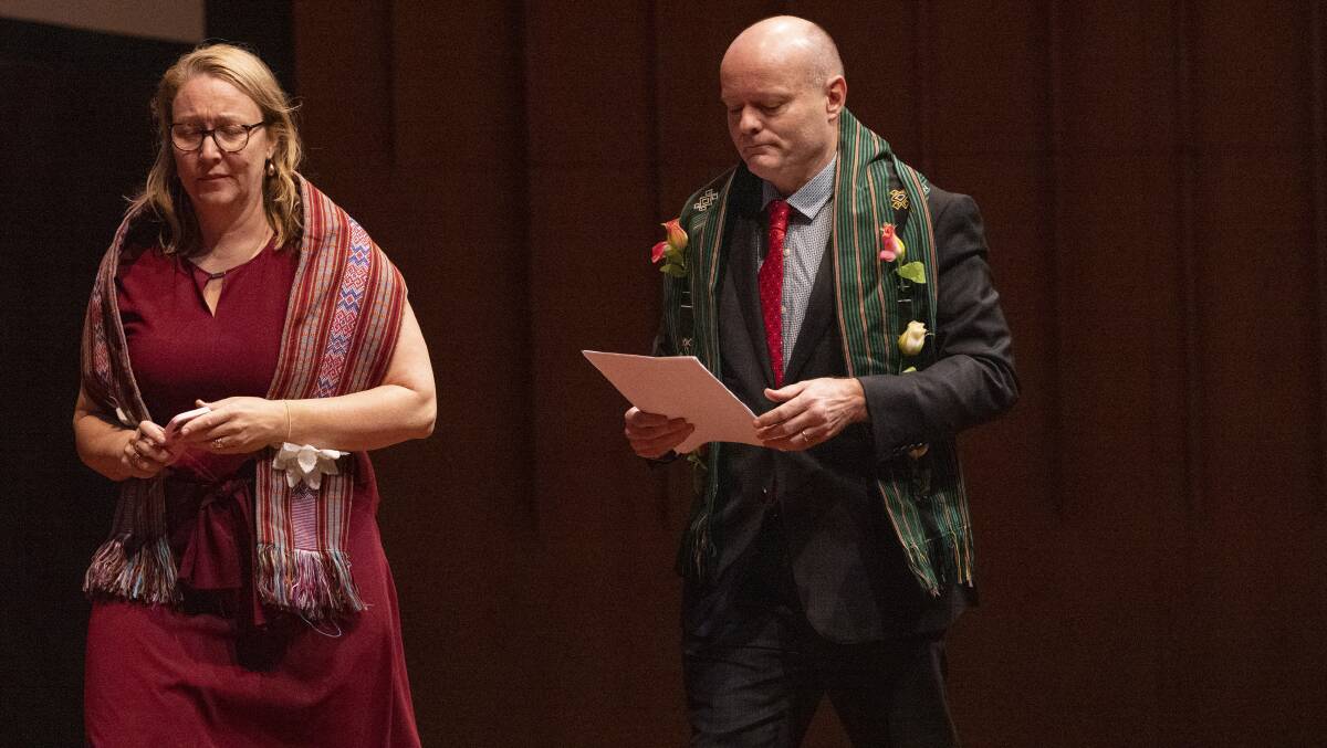 Canberra obstetrician Dr David O'Rourke and his wife Sue-Ann, wearing shawls from a hospital in West Timor where they and Dr Scott volunteered, also spoke at the memorial. Picture: Keegan Carroll
