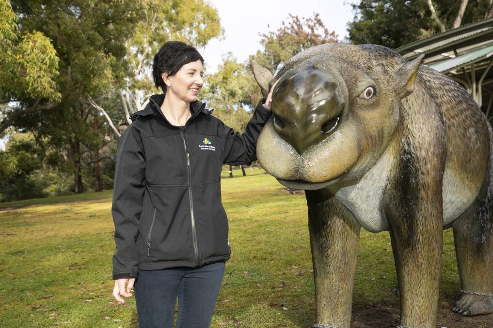  Australian National Botanic Gardens events manager Megan Donaldson with a Diprotodon. Picture: Keegan Carroll