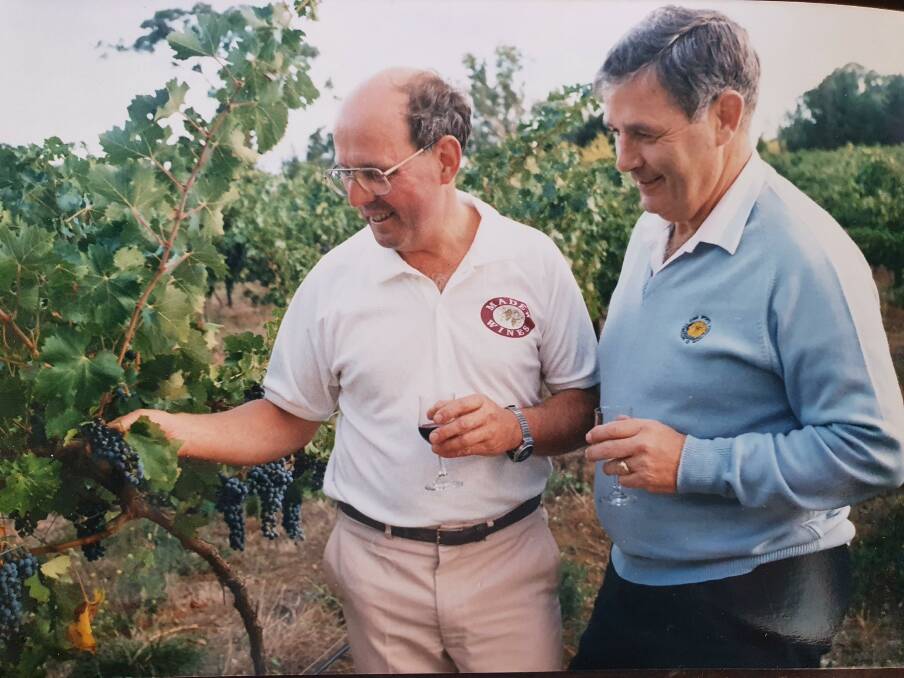 Dr David Madew (left) in his Queanbeyan vineyard with the Canberra Raiders' first coach Don Furner. Picture: Supplied