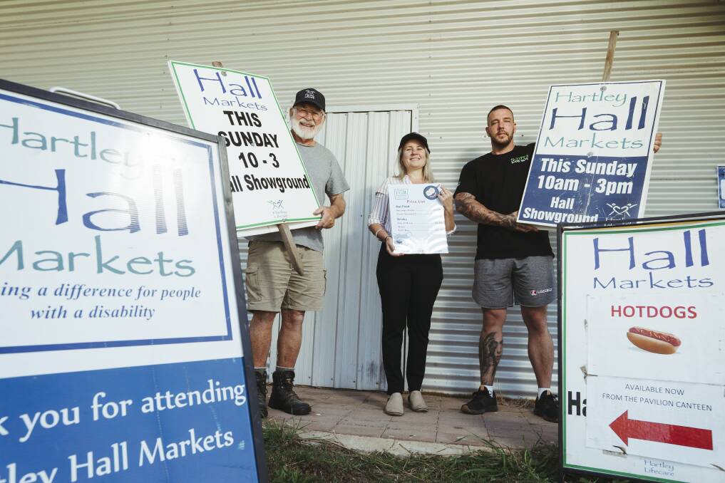 Hall markets volunteer Tony Morris, manager Mel Hugg, and Scott's Food Vans owner Scott Evans at the Hall showground on Friday ahead of Sunday's re-opening of the markets after a year. Picture: Dion Georgopoulos 