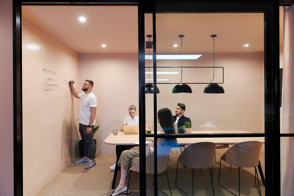 The boardroom also features a "pinkboard wall" for a sense of fun.
