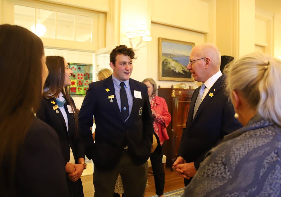 St Mary MacKillop College school captain Zachary Cuningham speaks with the Governor-General. Picture: Supplied