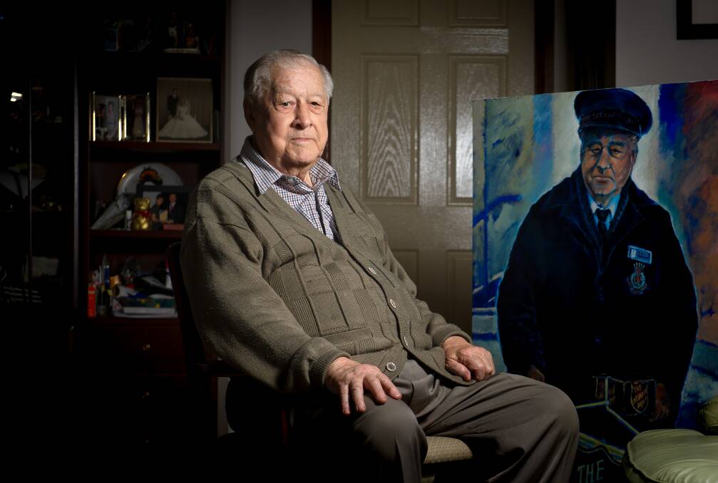 Alan Jessop, 90, at his home in Palmerston with a portrait of him by Barbara van der Linden. Picture: Elesa Kurtz