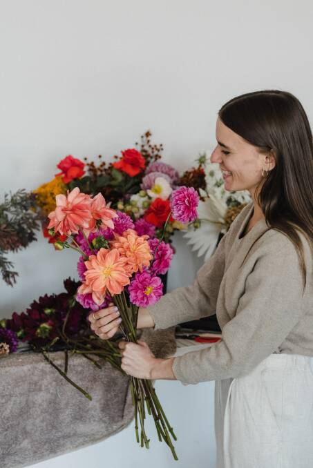Larissa Hrstic with some gorgeous fresh blooms. Picture: Lauren Campbell