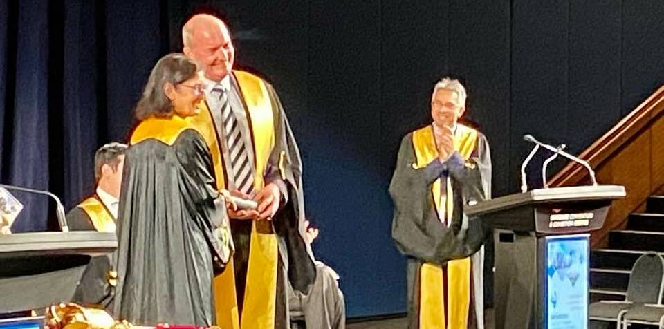 Professor Paul Smith receiving the Award for Excellence in Surgery from the Royal Australasian College of Surgeons' president Dr Sally Langley. Picture: Supplied