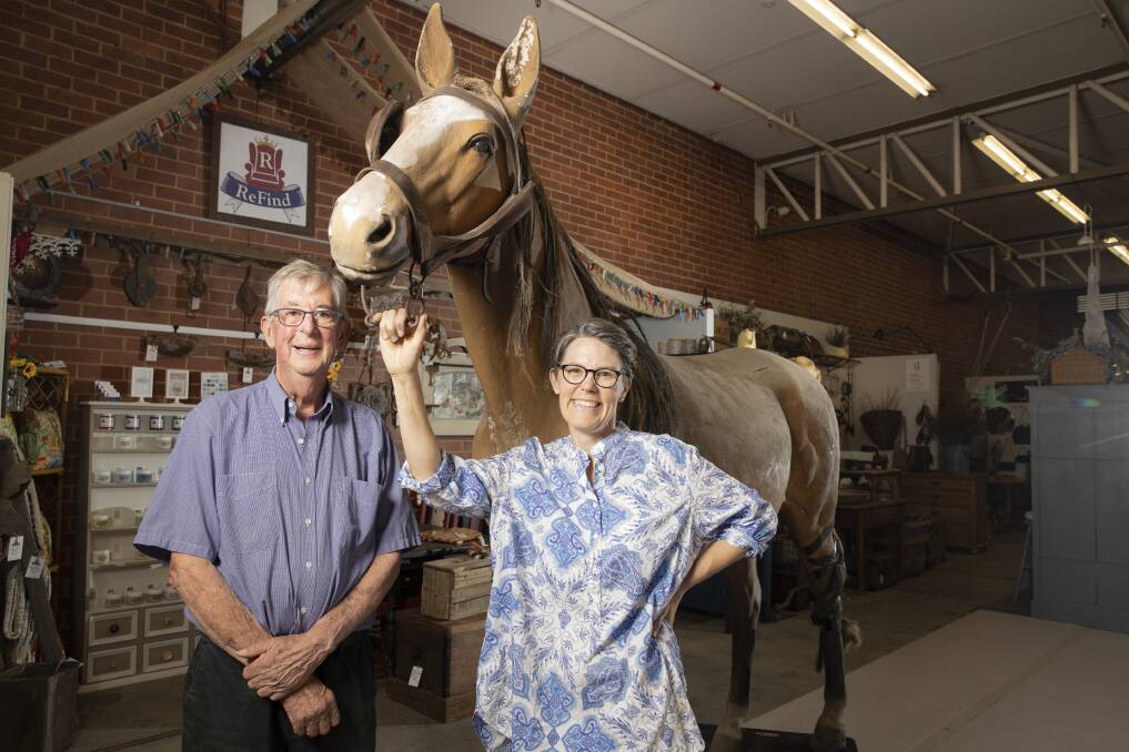 Dirty Jane's owner Jane Crowley, with dad Athol Salter, in the new Dirty Jane's in Fyshwick on Friday. There is a competition to name the store horse. Picture: Sitthixay Ditthavong