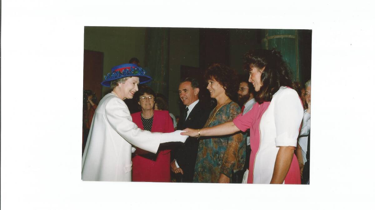Chrissie Standen meets the Queen at Parliament House in 1992. Picture: Supplied