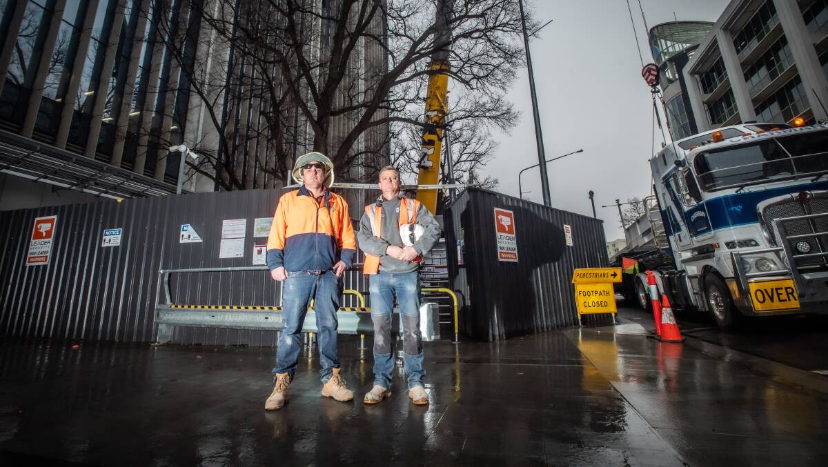 Workman Josh Nichol and Leigh Radburn have set up a Go Fund Me page for the family of their much-loved workmate Michael "Mick" Vecchi who was a dogman for Titan Cranes on the Civic Quarter 2 site and tragically passed away last month as the result of a motorcycle accident. Picture: Karleen Minney