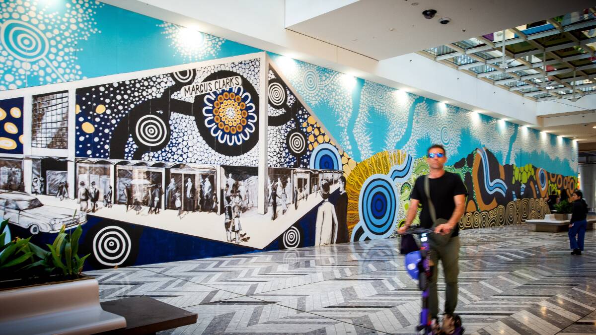 The Canberra Centre has commissioned a new mural (near the old Target) to celebrate the 60th anniversary of the Monaro Mall, and its place in the modern world. Picture by Elesa Kurtz