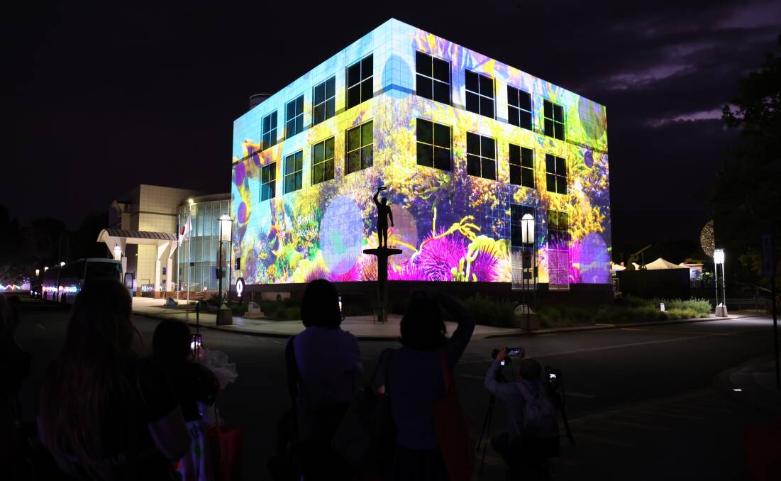 Questacon lit up for this year's Enlighten. Picture by James Croucher