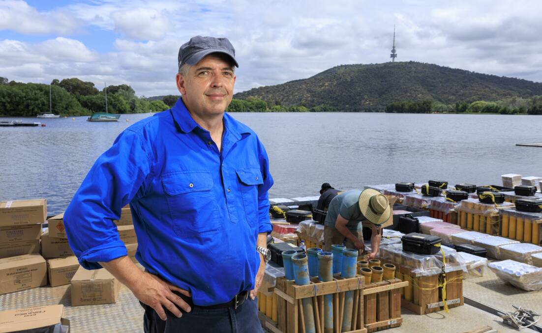 Fireworks Australia owner Marty Brady on Friday preparing the pontoons carrying fireworks for New Year's Eve on Lake Burley Griffin. Picture by Keegan Carroll
