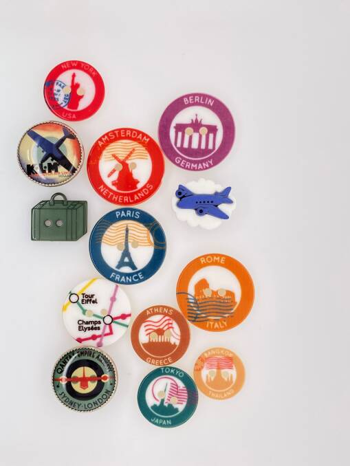 A series of travelled-inspired buttons. Picture supplied 