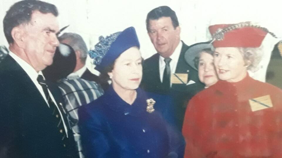Mary Stuart (right) meeting the Queen at Thoroughbred Park in 1988: "My husband Dugald Stuart (now deceased) was chairman of the ACT Racing Club. I was given the task of serving the Queen afternoon tea. We also attended a dinner at the new Parliament House the following evening where I remember the Queen crossing the room to say hello to my husband and thank him for the lovely day at the races." Picture: Supplied
