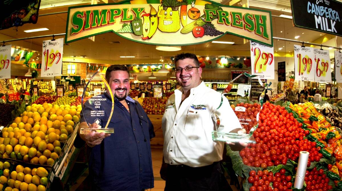 Frank (left) at his Simply Fresh store at Woden in 2002. Picture by Andrew Campbell