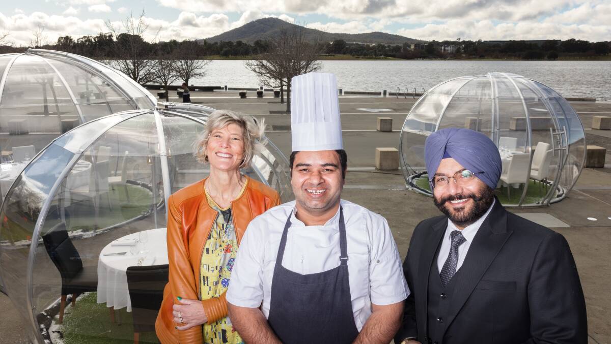 Dining Dome director Dr Lynne Pezzullo with Water's Edge head chef Avtar Singh and managing director Will Bal. The domes by the lake are in place until August but talks are underway to make them a permanent attraction. Pictures: Sitthixay Ditthavong