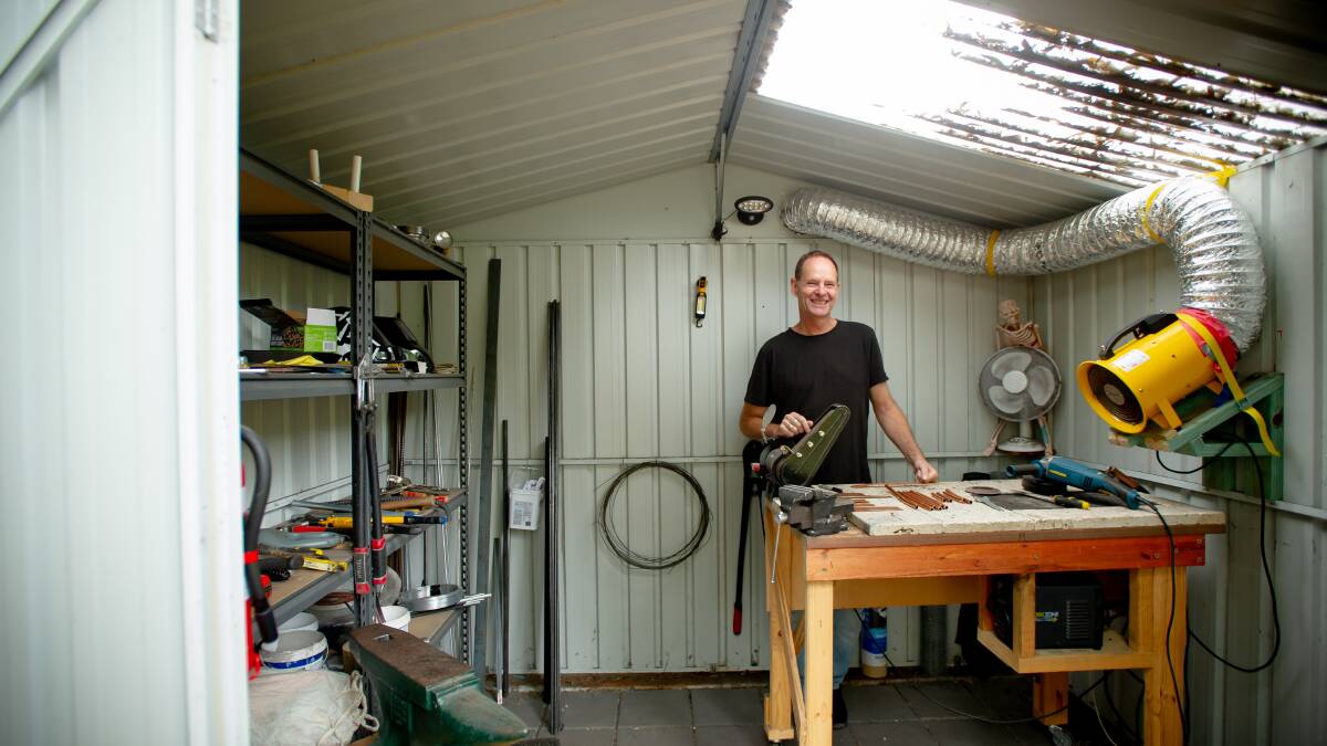Mr Smith is his workshop at home in the hills on the eastern edge of Queanbeyan. Picture by Elesa Kurtz
