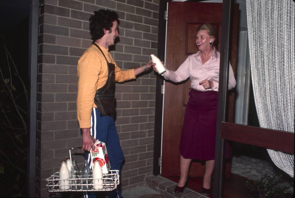 A Canberra milko delivering milk in glass bottles back in the 1970s. Picture: Capitol Chilled Foods 