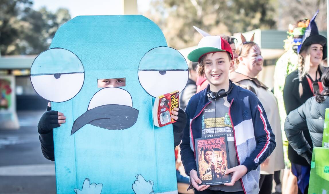 Latham Primary Year Six students Ethan Burke (who came as Homey from the Real Pigeons series) and James Sutcliffe who dressed up as Dustin from Stranger Things. Picture: Karleen Minney