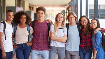 High school kids that look pleasingly like a United Colours of Benetton ad from the 1980s. Picture: Shutterstock