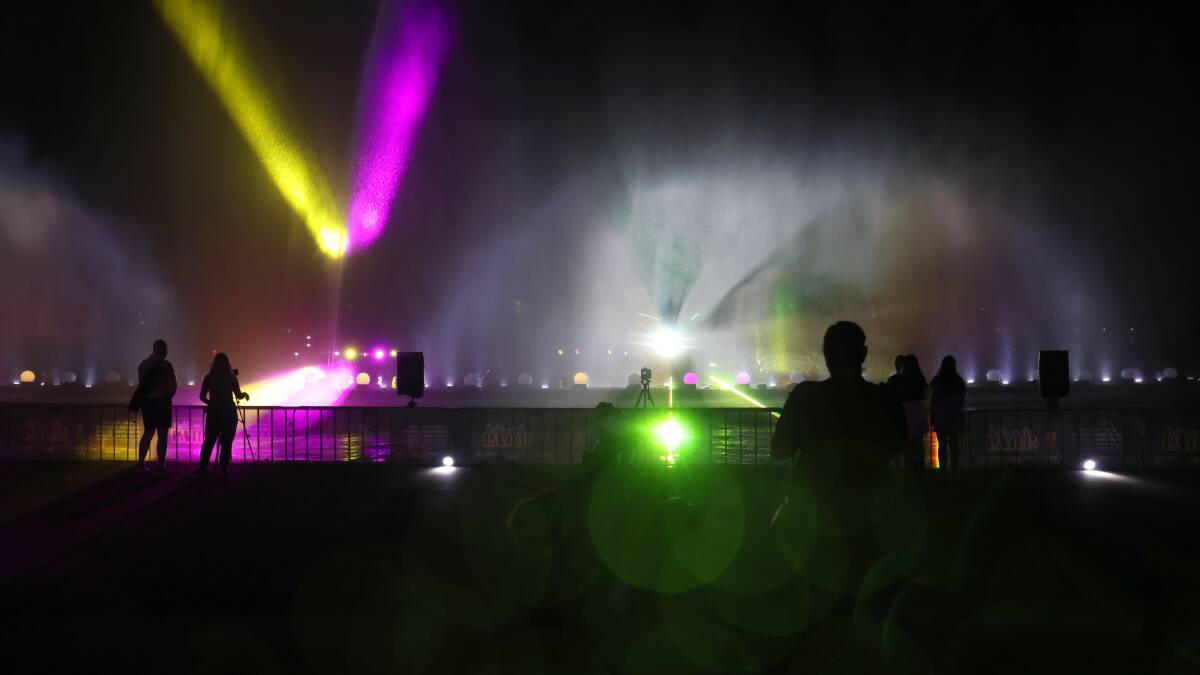 Water and light came together for the show. This was taken at a media preview before the crowds. Picture by James Croucher