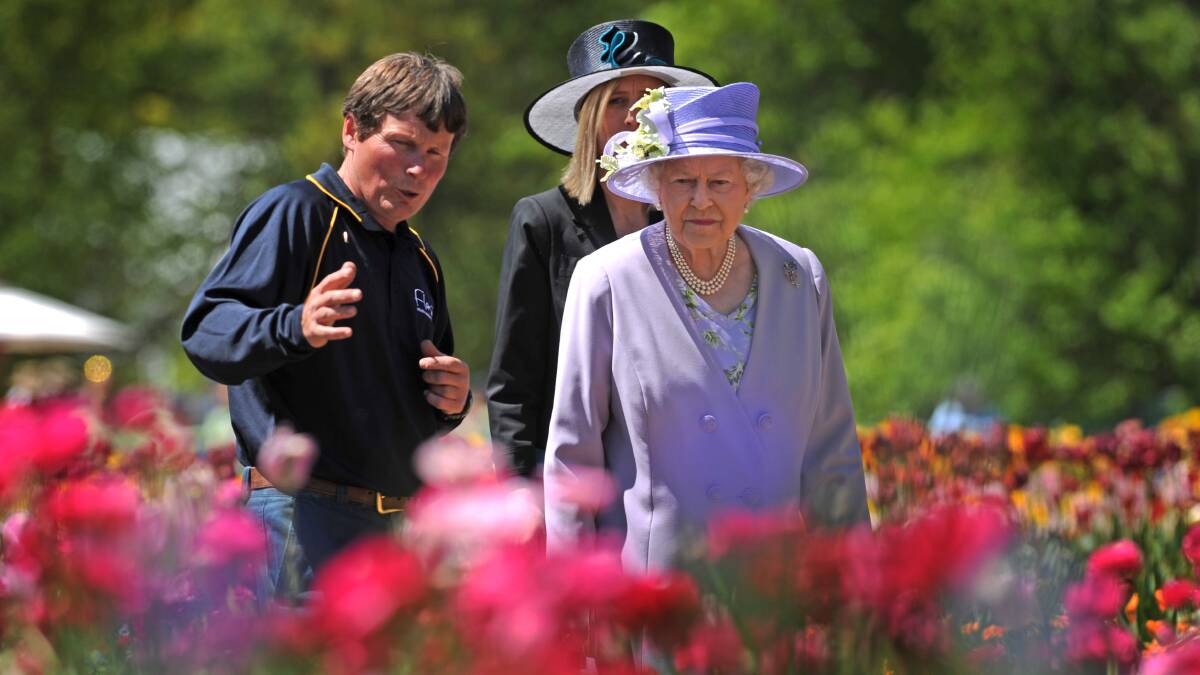 The Queen with Floriade head gardener Andrew Forster and then Chief Minister Katy Gallagher in 2011 during her final visit to Canberra. Picture by Marina Neil.
