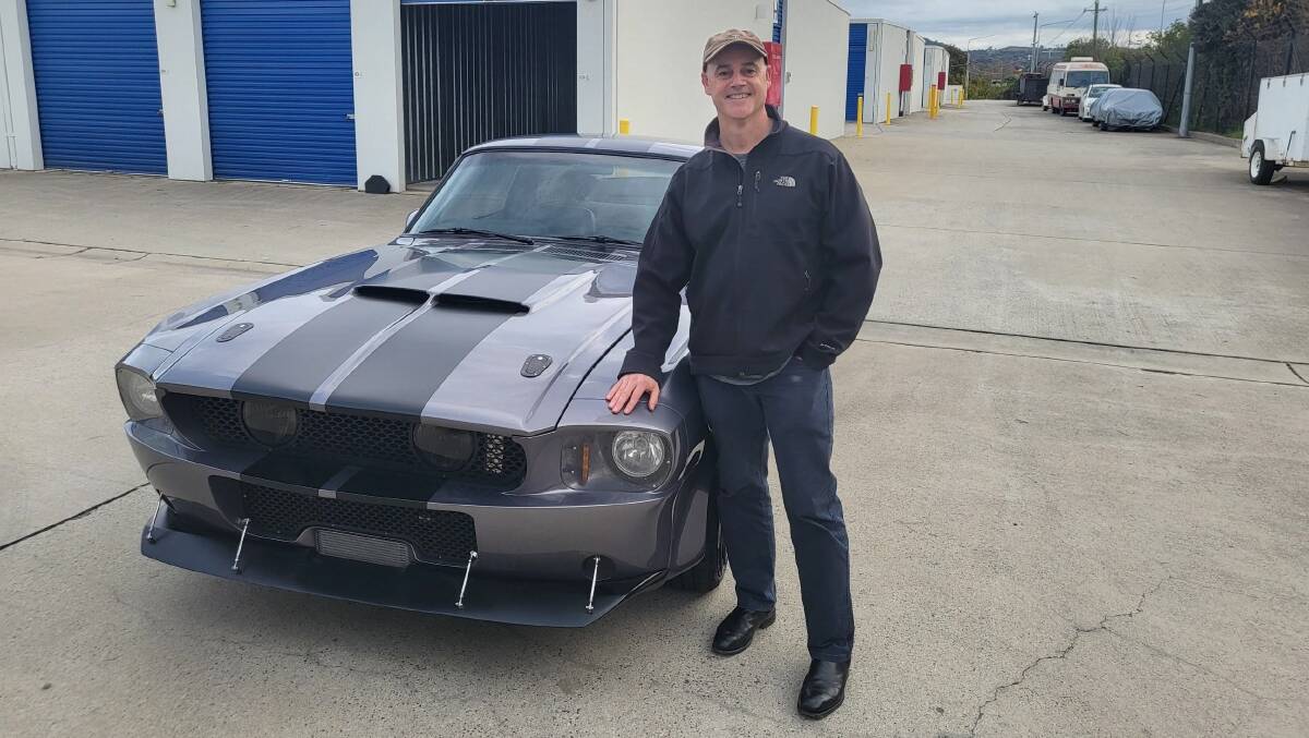 Matt Kimberly with his prize - a 1968 Mustang. Picture: Supplied