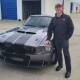 Matt Kimberly with his prize - a 1968 Mustang. Picture: Supplied