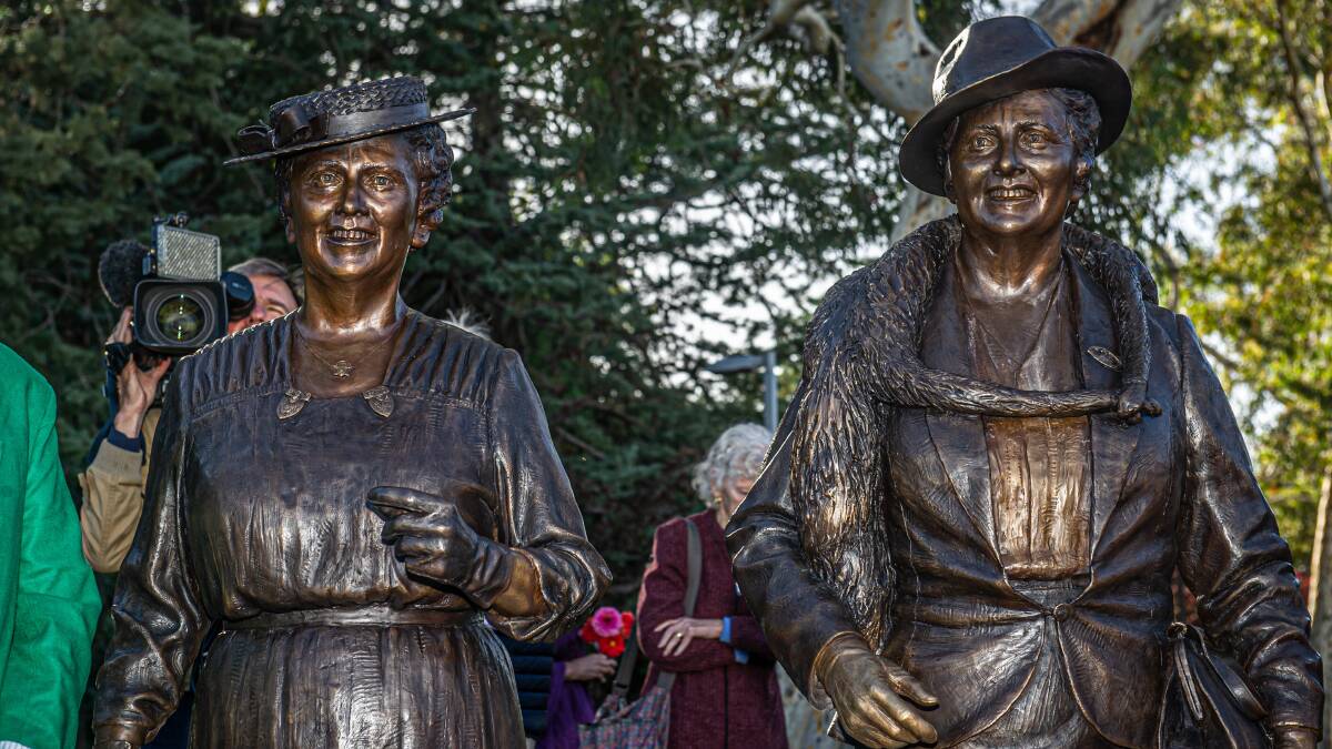 The sculpture shows Dame Dorothy Tangney and Dame Enid Lyons striding towards parliament. Picture by Karleen Minney